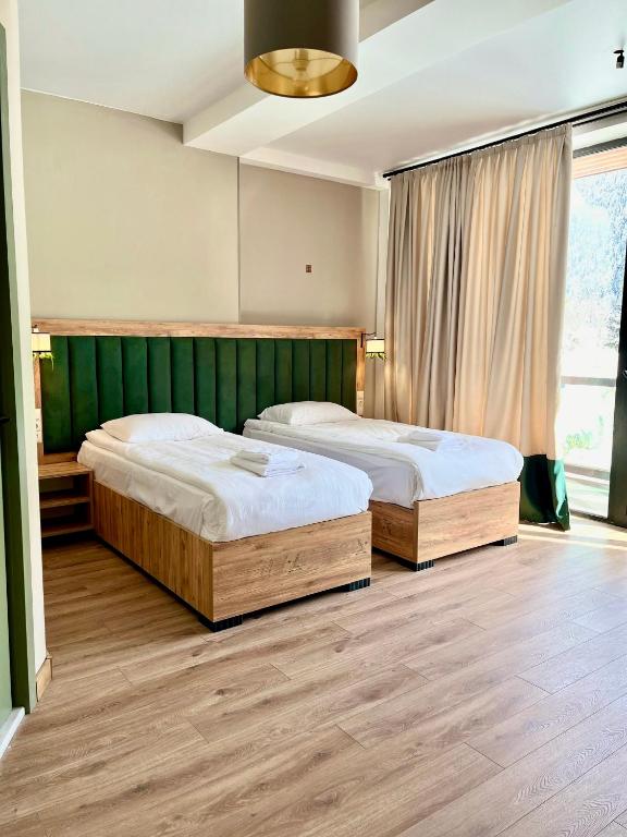 Postel nebo postele na pokoji v ubytování Kakhri Resort