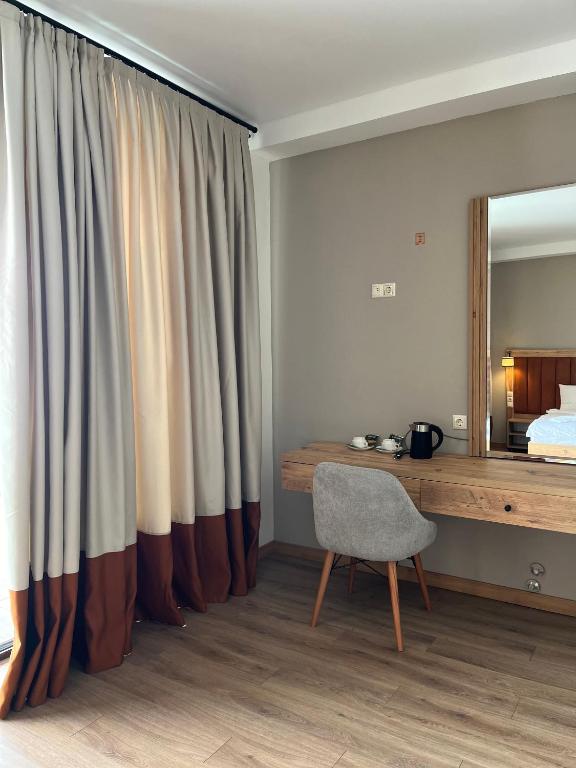 Postel nebo postele na pokoji v ubytování Kakhri Resort