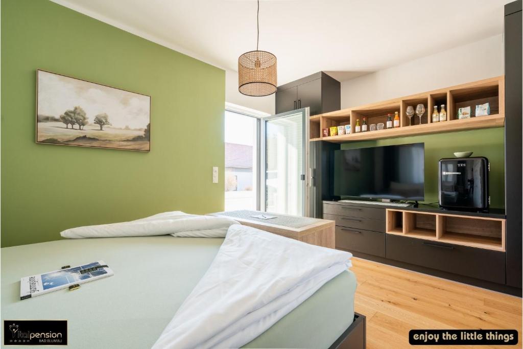 TV a/nebo společenská místnost v ubytování Vitalpension Bad Blumau - ADULTS ONLY