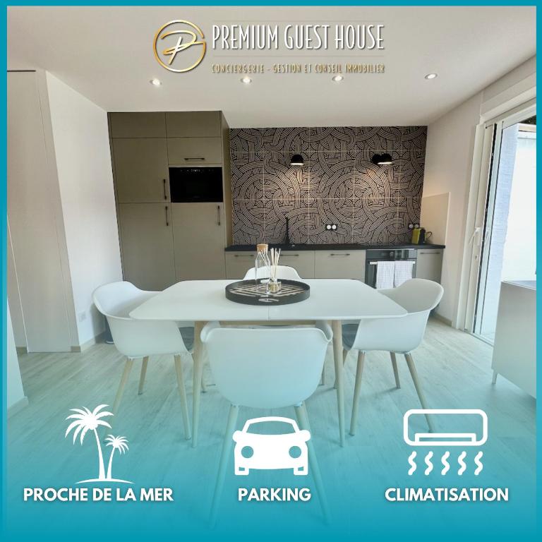 une salle à manger blanche avec une table et des chaises blanches dans l'établissement PGH N12 - Thalasso & Plage à 2 pas, Parking Privé, à La Grande Motte