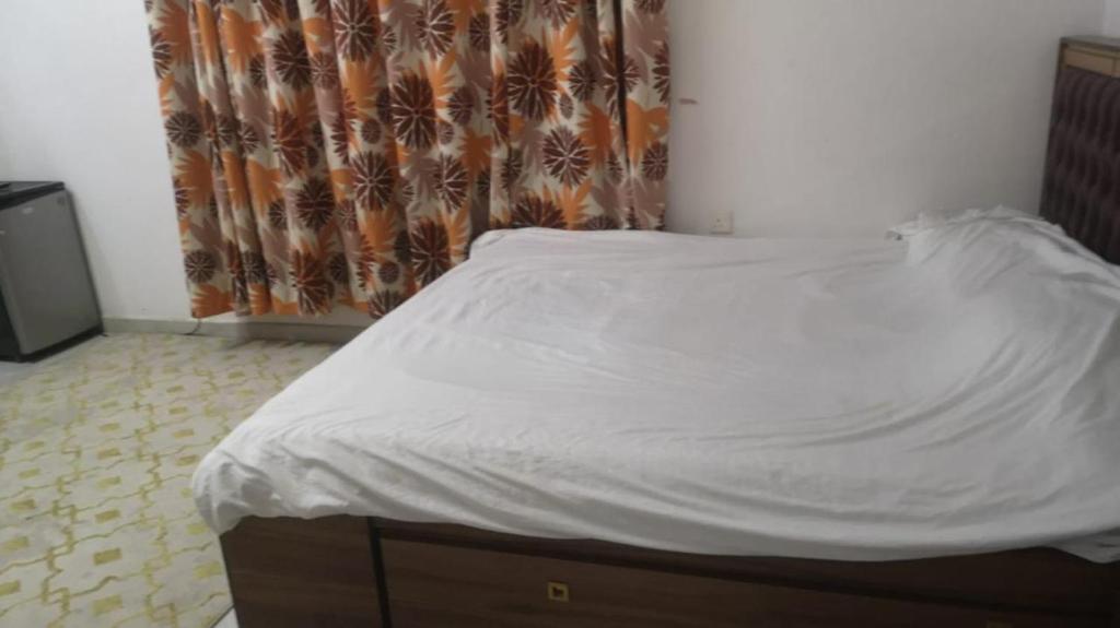 Postel nebo postele na pokoji v ubytování سكنات قصر الياسمين