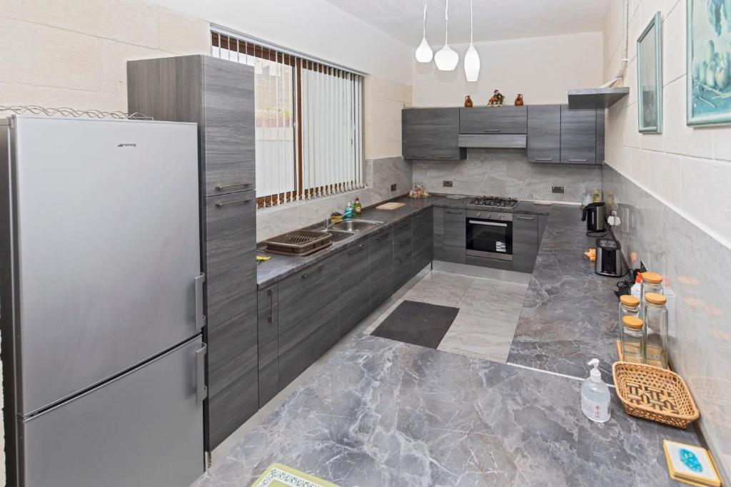 Kuchyň nebo kuchyňský kout v ubytování Holiday Home with Private Pool in Gozo