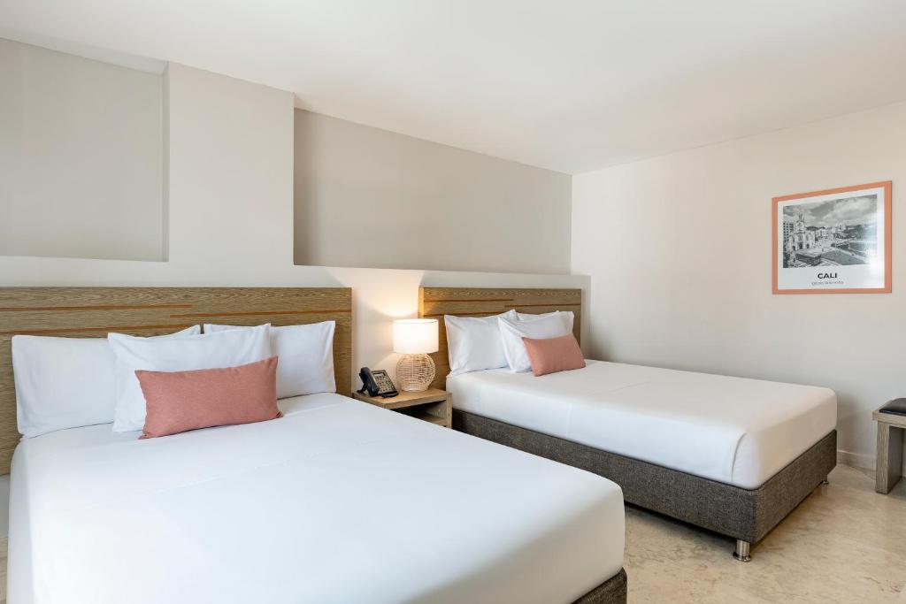 Letto o letti in una camera di Hotel MS Ciudad Jardin