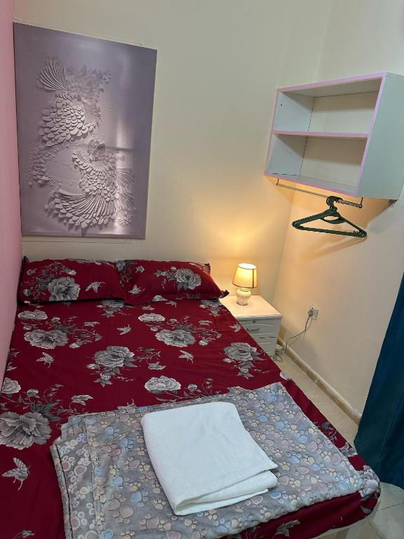 Postel nebo postele na pokoji v ubytování Leema's House