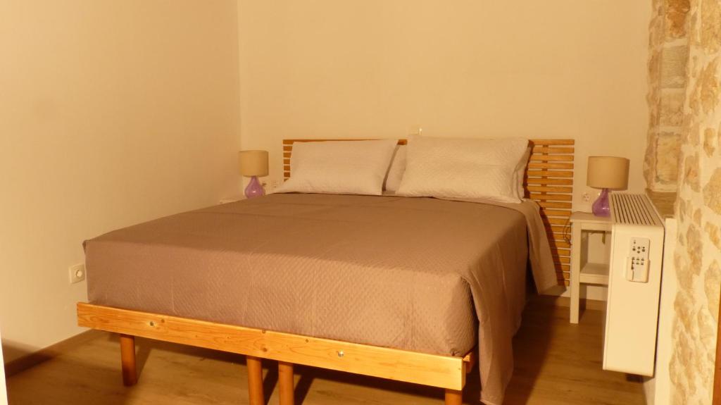 Postel nebo postele na pokoji v ubytování To Portoni Guesthouse