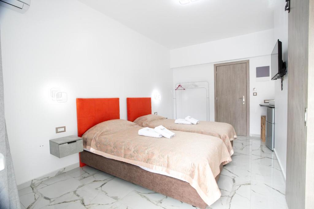 En eller flere senger på et rom på Star Experience Stay - Rhodes Town