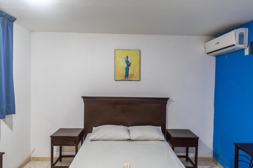 Postel nebo postele na pokoji v ubytování Hotel Ziami
