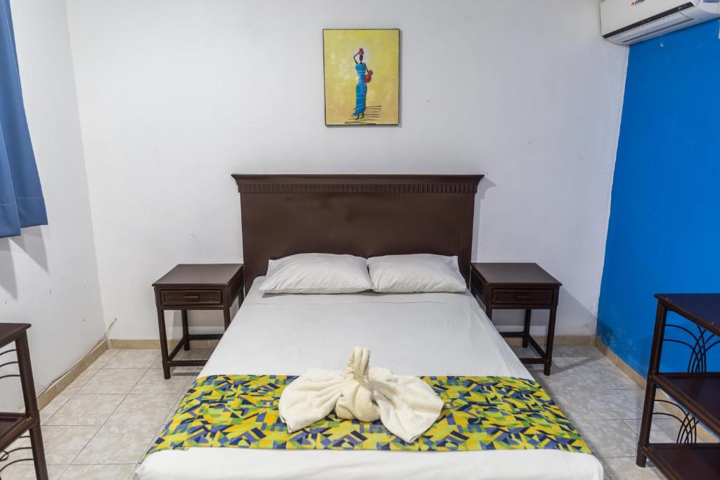 Postel nebo postele na pokoji v ubytování Hotel Ziami