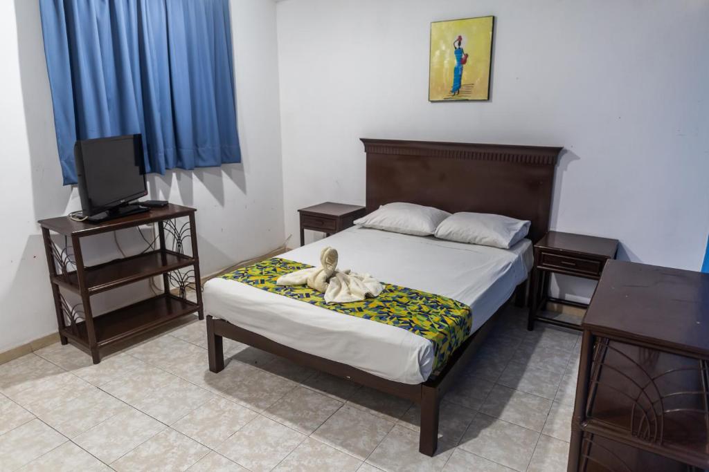 Postel nebo postele na pokoji v ubytování Hotel Ziami