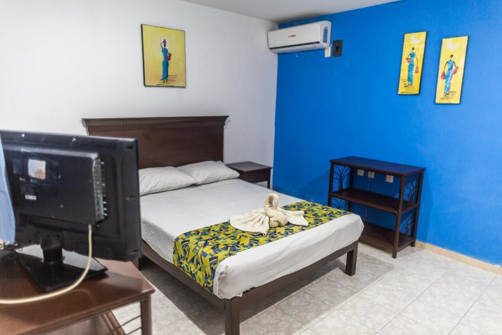 Postel nebo postele na pokoji v ubytování Hotel Ziami