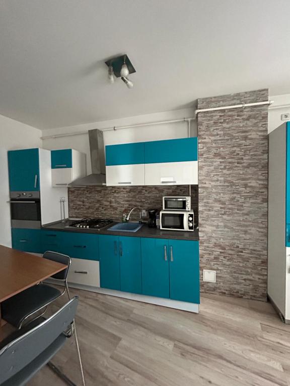 Kuchyň nebo kuchyňský kout v ubytování B&B Iulius