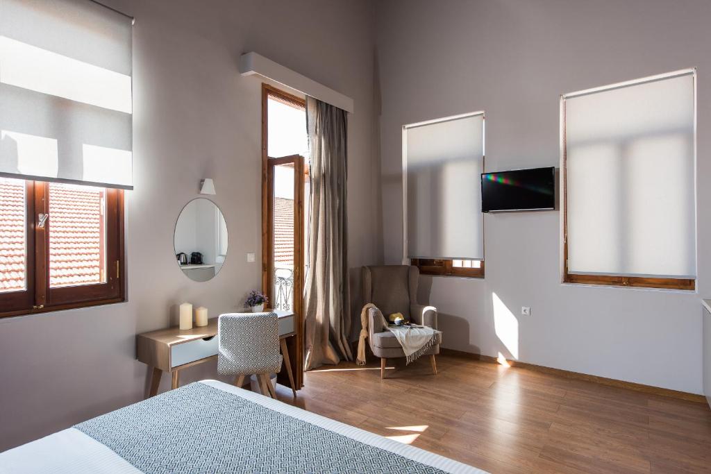 Telewizja i/lub zestaw kina domowego w obiekcie Bluebell Luxury Suites