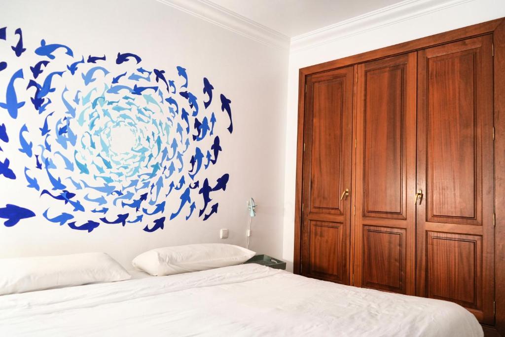 Postel nebo postele na pokoji v ubytování Casa Belharra By Mhousing