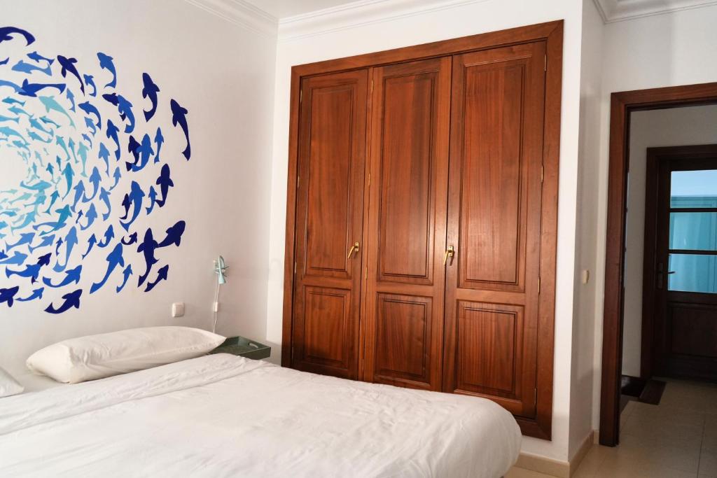 Postel nebo postele na pokoji v ubytování Casa Belharra By Mhousing