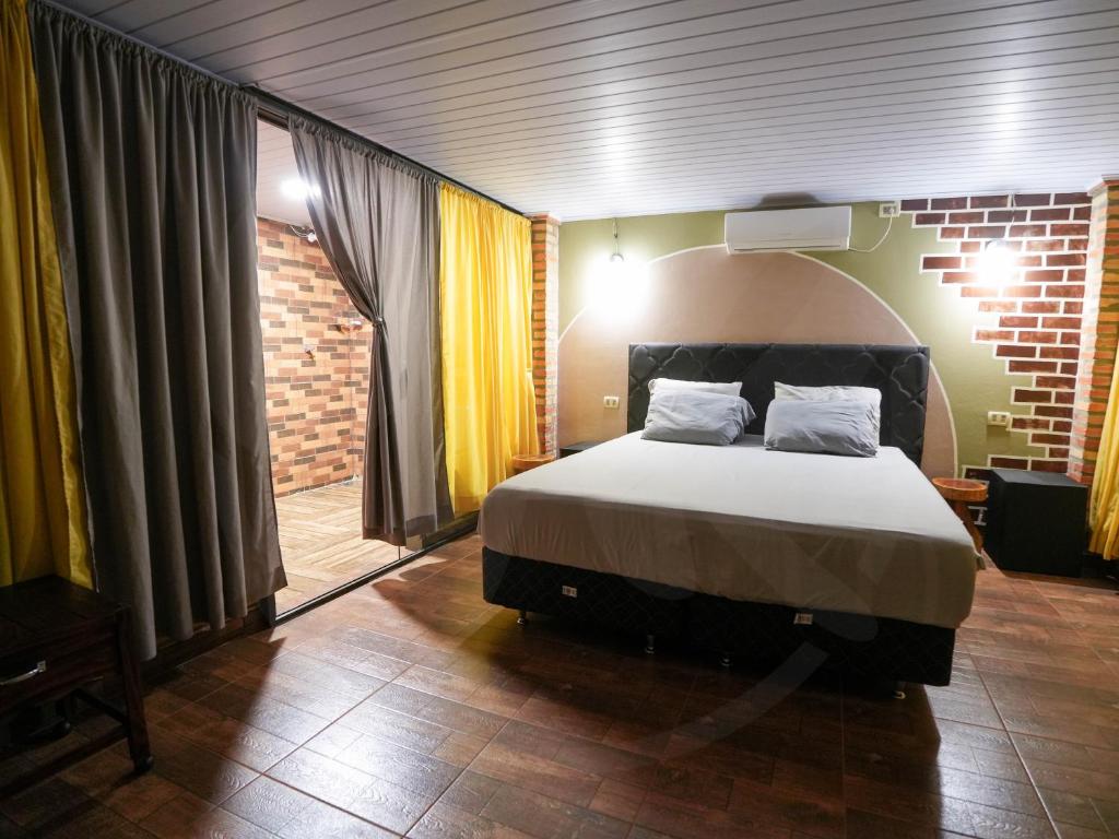 Postel nebo postele na pokoji v ubytování Yguazú Resort