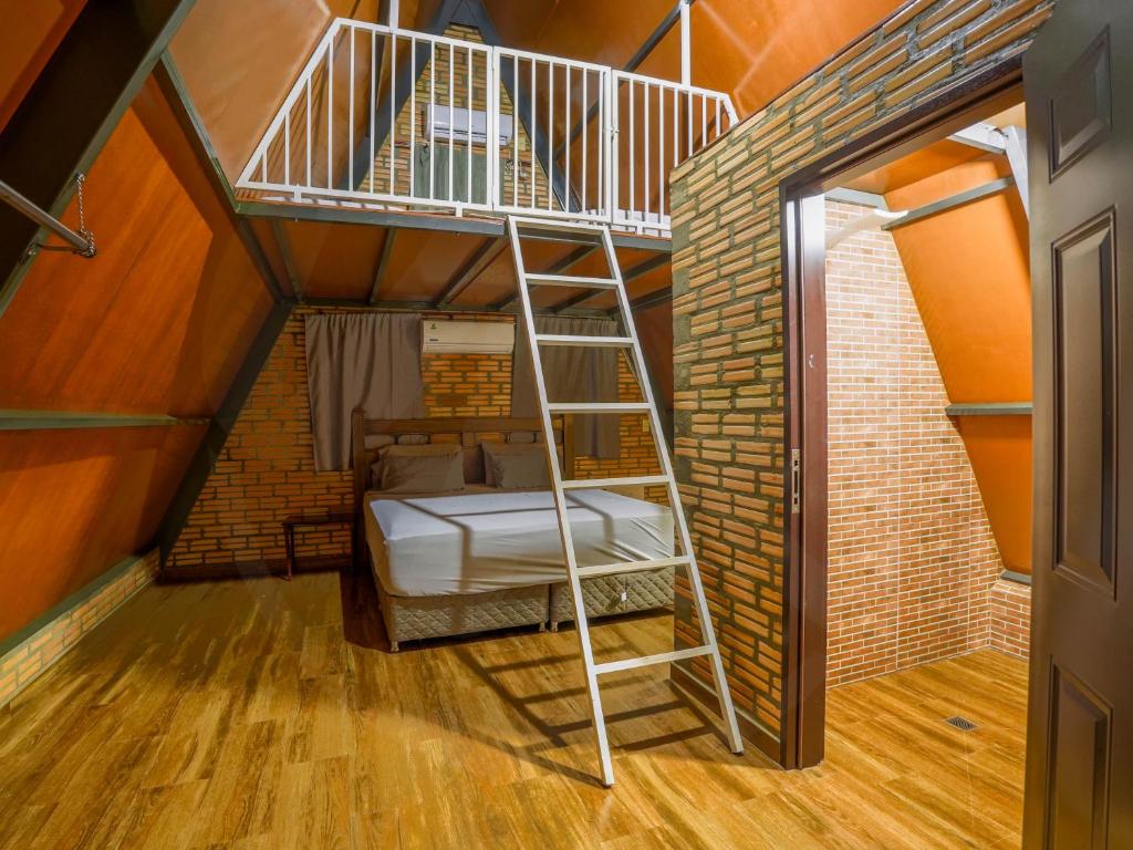 Postel nebo postele na pokoji v ubytování Yguazú Resort