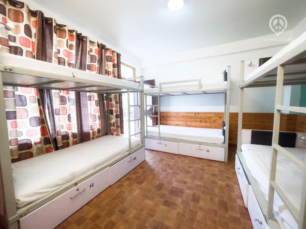 Postel nebo postele na pokoji v ubytování Dormigo