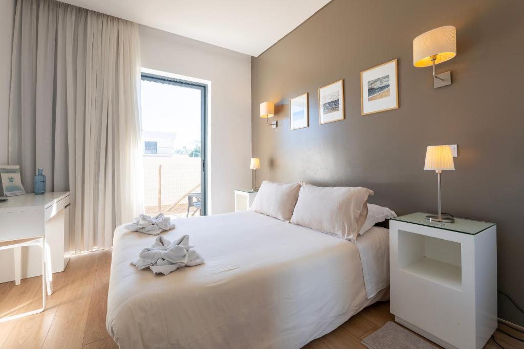 Cama ou camas em um quarto em Green & Sea Comporta Retreat
