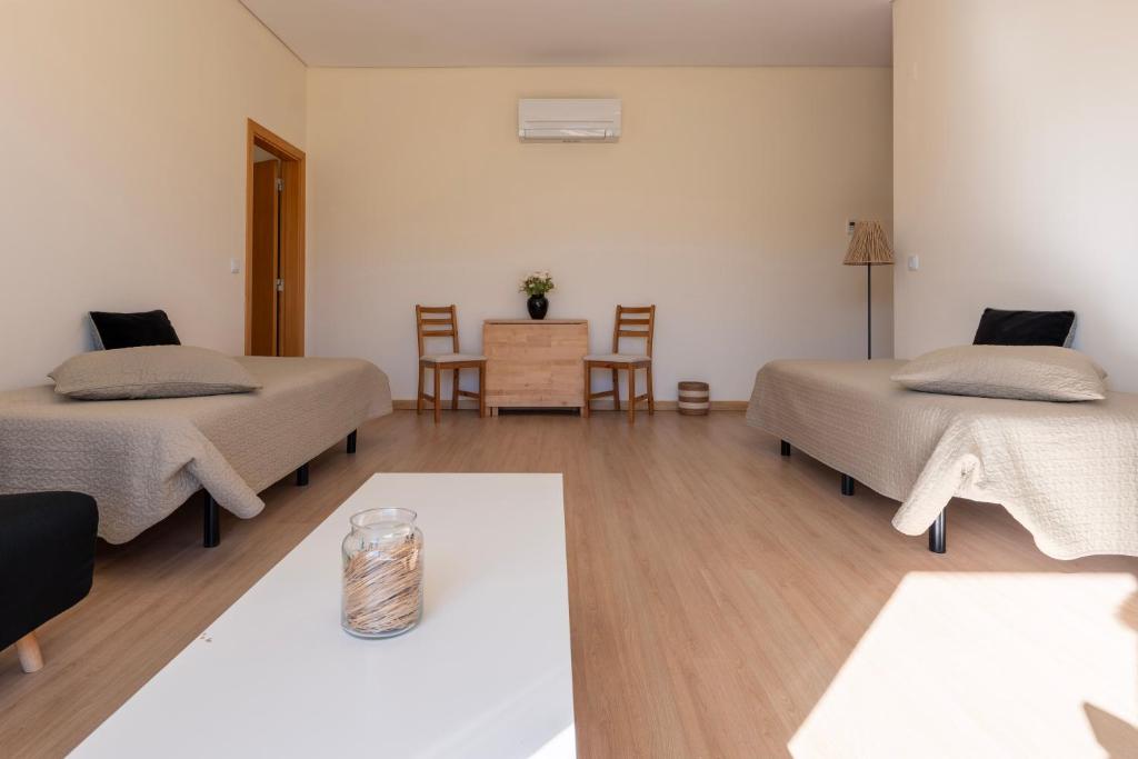 Cama ou camas em um quarto em Green & Sea Comporta Retreat