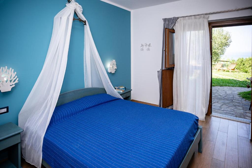 Postel nebo postele na pokoji v ubytování Antica Dimora Palinuro