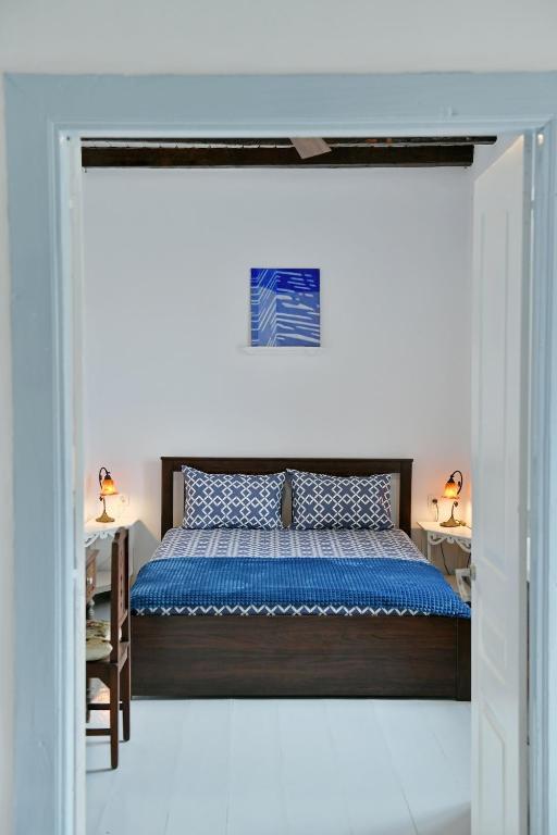 Postel nebo postele na pokoji v ubytování Serendipity Home