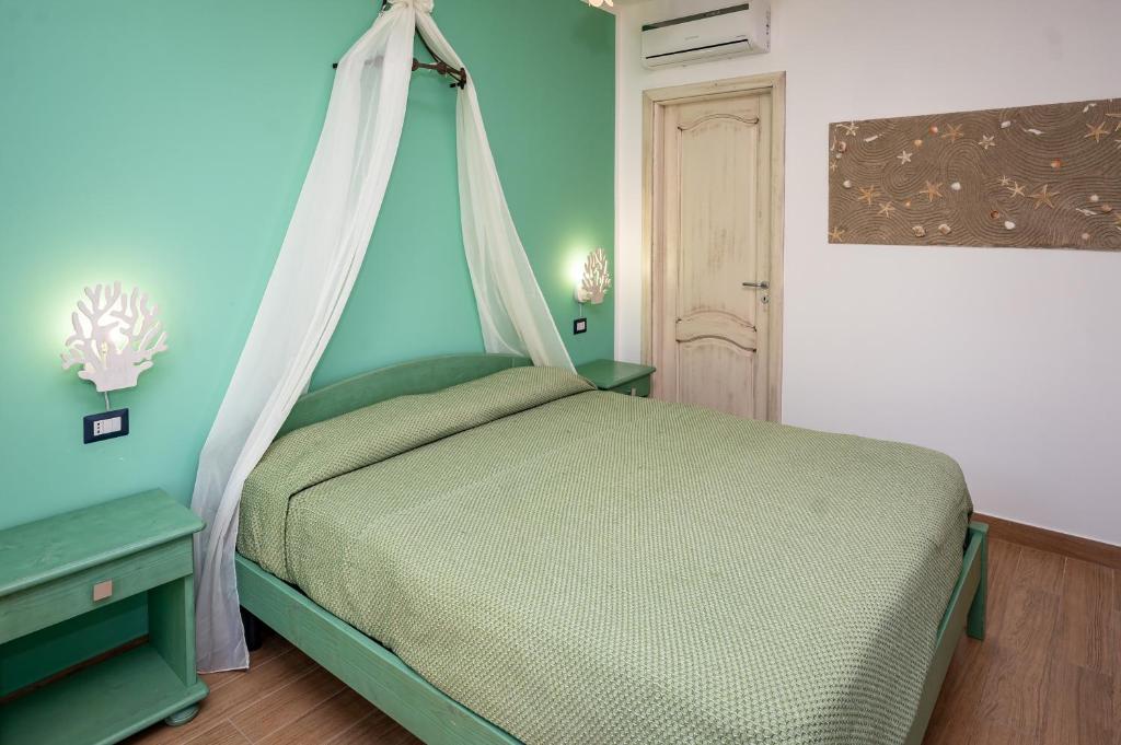 Postel nebo postele na pokoji v ubytování Antica Dimora Palinuro