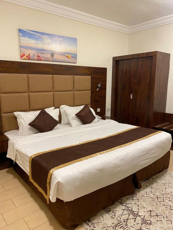 Postel nebo postele na pokoji v ubytování فندق فاتوران فرع ينبع