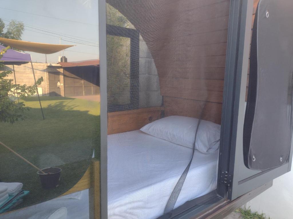 Letto o letti in una camera di Aldea Xochi cabañas