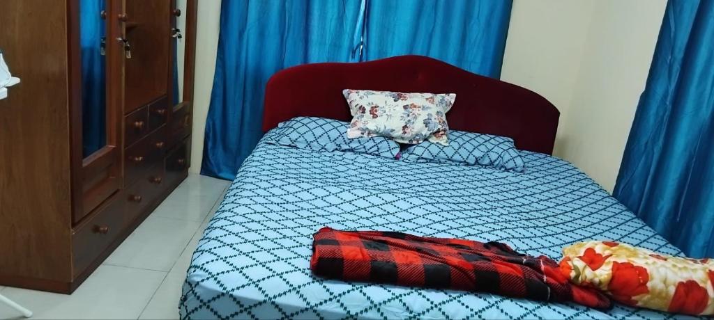 Postel nebo postele na pokoji v ubytování Hasmatullah Holiday Apartments