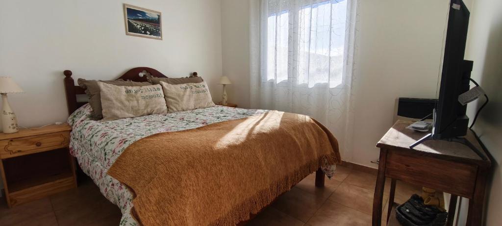 Et tv og/eller underholdning på Flores del Alma PSC