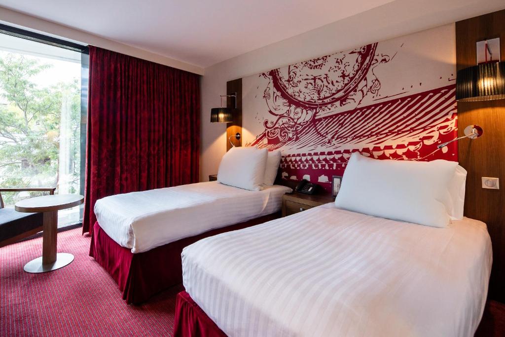 Postel nebo postele na pokoji v ubytování Radisson Blu Hotel, Montpellier