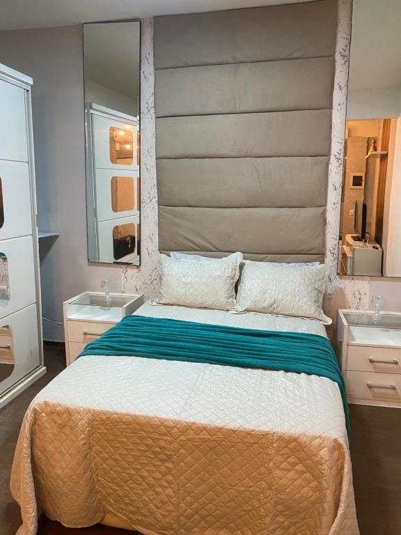 Ένα ή περισσότερα κρεβάτια σε δωμάτιο στο Sala e quarto próx ao Maracanã e Engenhão