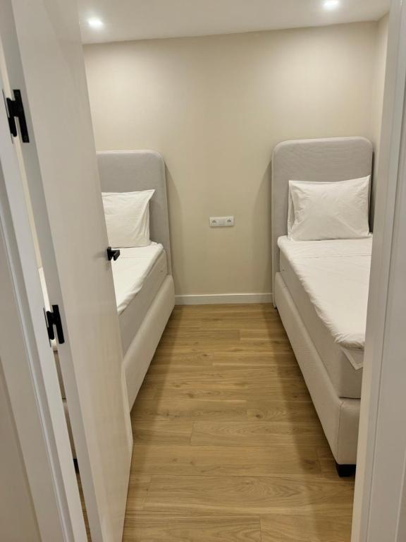 Postel nebo postele na pokoji v ubytování belle vue appartement al hoceima