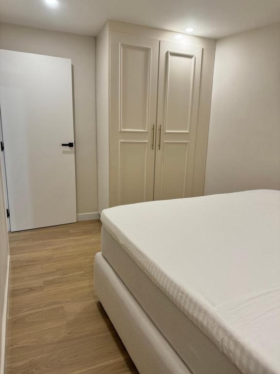 Postel nebo postele na pokoji v ubytování belle vue appartement al hoceima