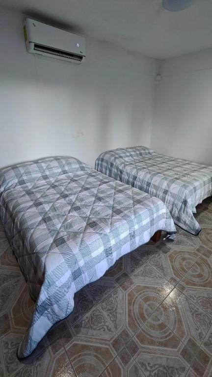 Postel nebo postele na pokoji v ubytování Habitacion Codice Maya 1