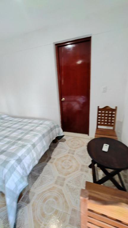 Postel nebo postele na pokoji v ubytování Habitacion Codice Maya 1