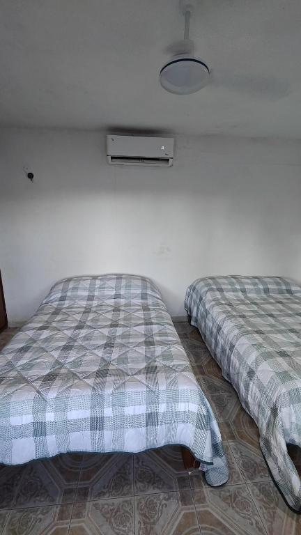 Postel nebo postele na pokoji v ubytování Habitacion Codice Maya 1