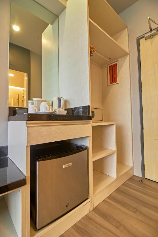 Kuchyň nebo kuchyňský kout v ubytování Cebu Hotel Plus