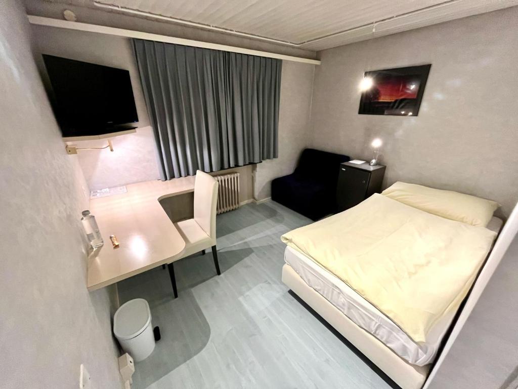 Postel nebo postele na pokoji v ubytování Seiler's Hotel