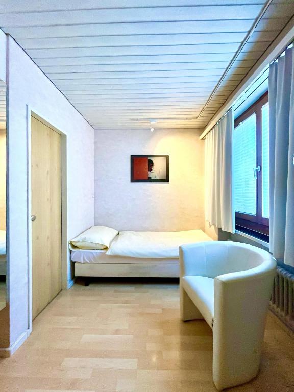 Postel nebo postele na pokoji v ubytování Seiler's Hotel