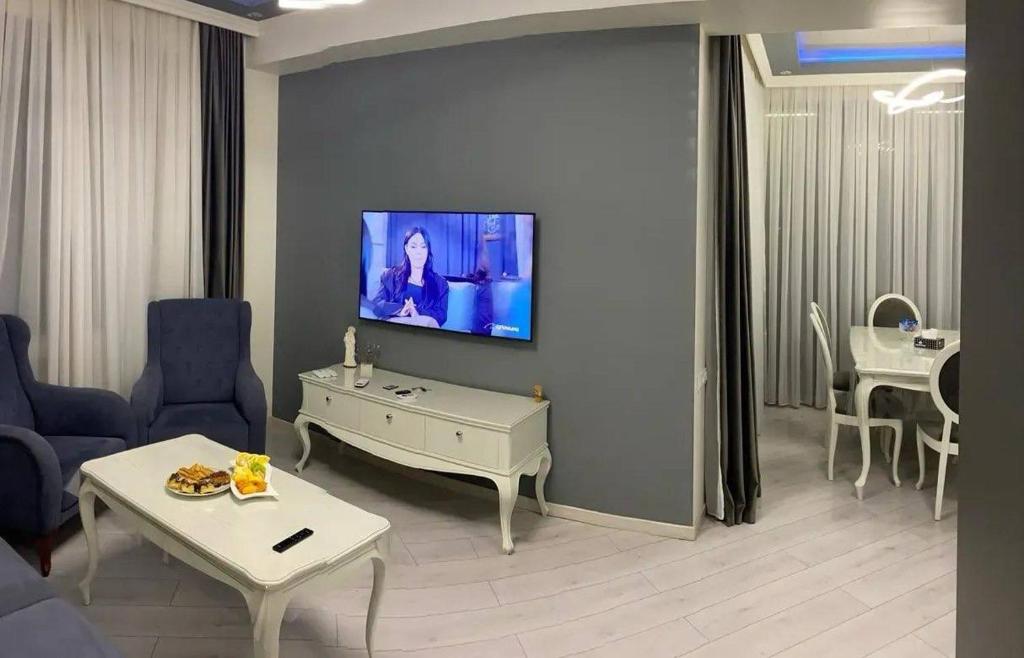 Μια τηλεόραση ή/και κέντρο ψυχαγωγίας στο Apartmány Adam's Place