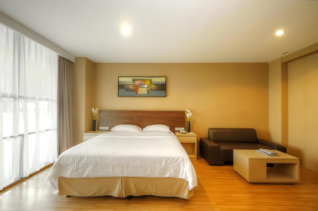 Voodi või voodid majutusasutuse Avissa Suites toas