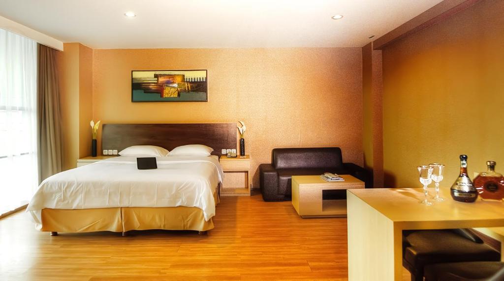 Voodi või voodid majutusasutuse Avissa Suites toas