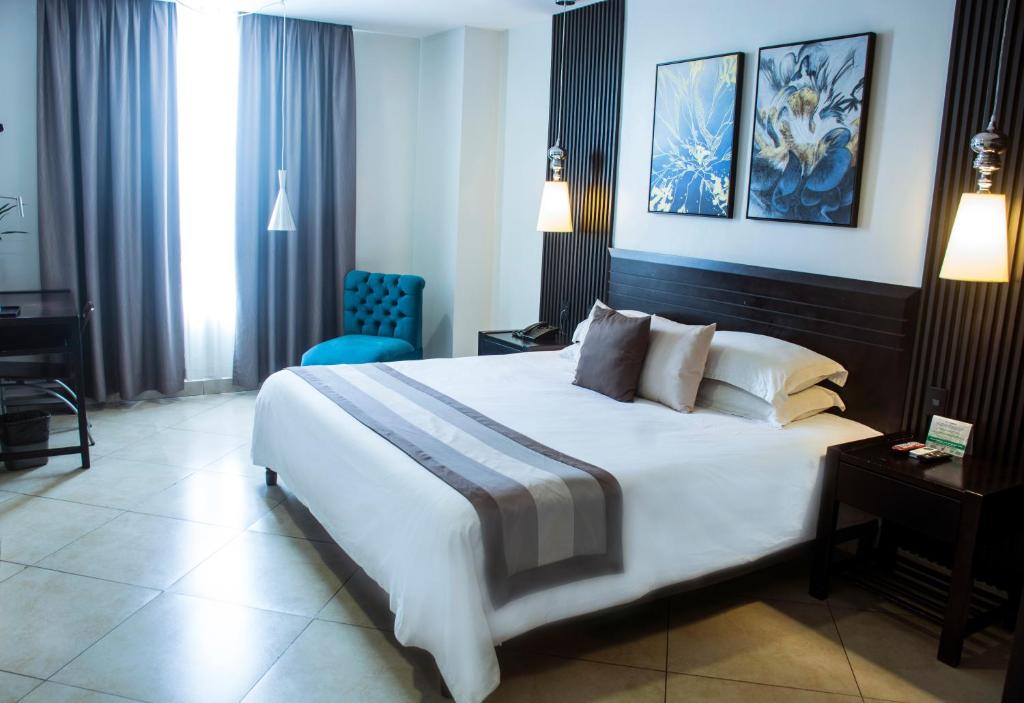 Voodi või voodid majutusasutuse Hotel Las Cascadas toas