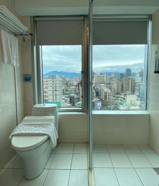 Bilik mandi di 西門雲町旅店 Sky Gate Hotel