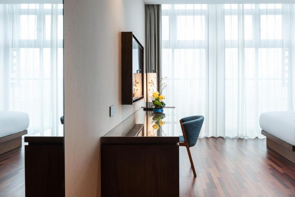 TV a/nebo společenská místnost v ubytování SSAW Boutique Hotel Foshan Qiandeng Lake