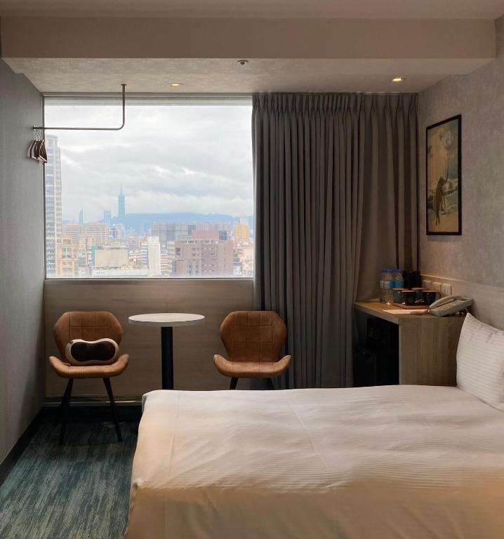 Katil atau katil-katil dalam bilik di 西門雲町旅店 Sky Gate Hotel