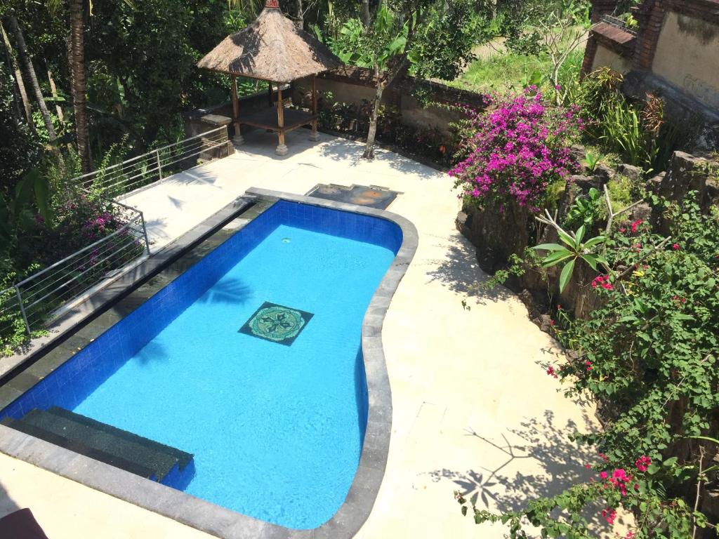 Bazén v ubytování Puri Saron Hotel Madangan - Gianyar nebo v jeho okolí
