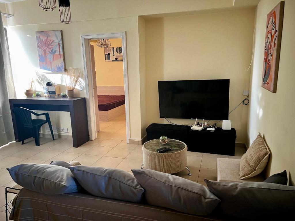 TV a/nebo společenská místnost v ubytování Cosy and modern flat in Mauritius