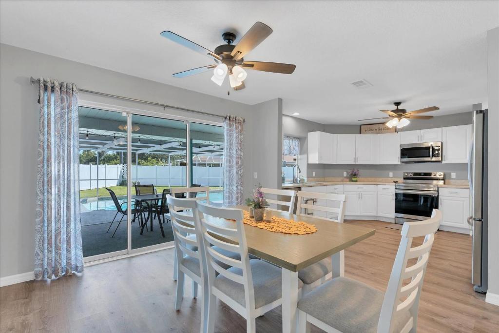a kitchen and dining room with a table and chairs at DBD1014 in Port Charlotte
